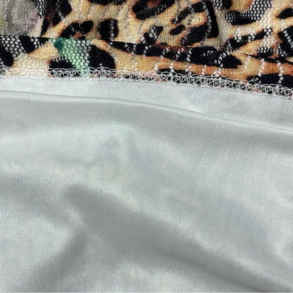 Printed lace order sleeve animal and floral print body con dress. - Picture 9 of 11